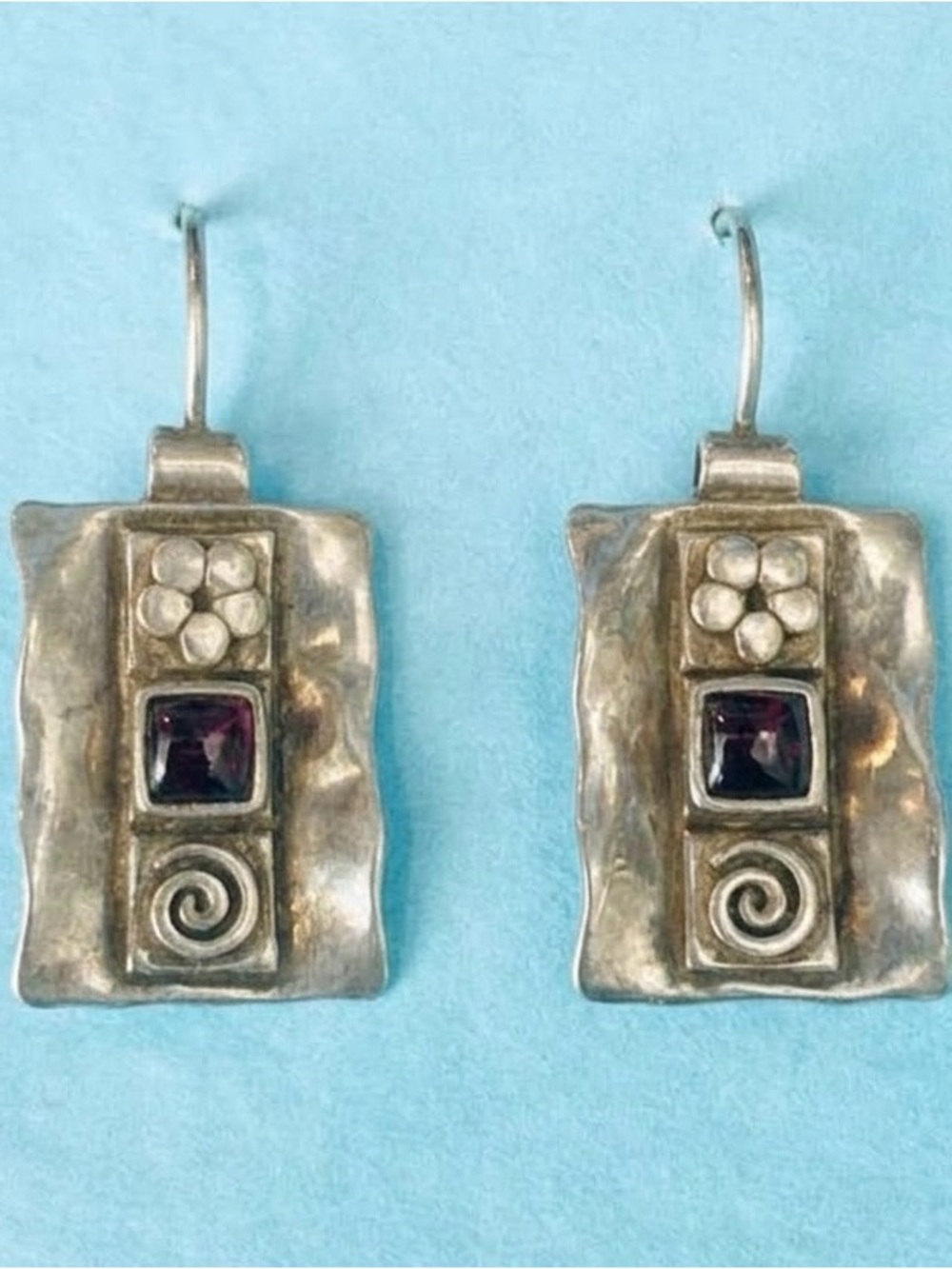 Sterling Silver Embossed Earrings with Garnet Accents